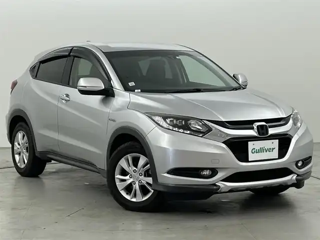 ホンダ ヴェゼル ハイブリッド X 福岡県 2014(平26)年 7.1万km アラバスターシルバーメタリック 純正ナビ（Ｂｌｕｅｔｏｏｔｈ，フルセグＴＶ）　/バックカメラ　/ＥＴＣ　/前方ドラレコ　/クルーズコントロール　/シティブレーキアクティブシステム　/横滑り防止装置　/ＥＣＯＮ　/パドルシフト　/ステアリングリモコン