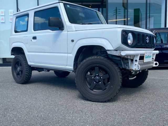 スズキ ジムニー XG 兵庫県 2020(令2)年 7.9万km スペリアホワイト ・2人乗り公認登録/・2インチUP/・４WD/・５MT/・社外BTオーディオ/・社外前後バンパー/・社外マフラー/・社外16AW/・キーレスキー/・社外テールレンズ/・スペアタイヤ車載
