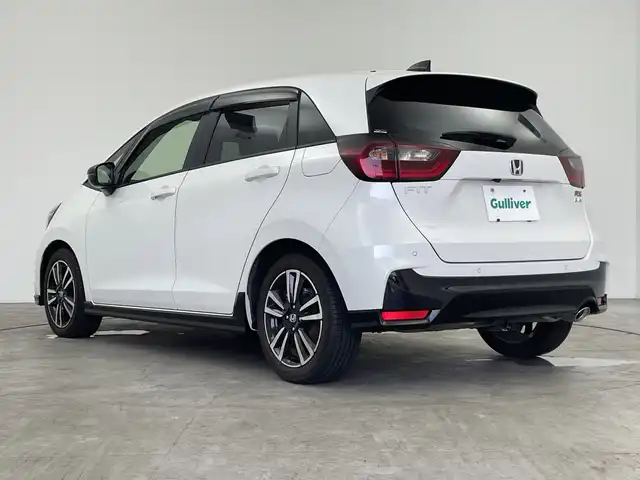 ホンダ フィット e:HEV RS 三重県 2022(令4)年 1.7万km プラチナホワイトパール 純正8インチナビ/フルセグ/バックカメラ/追従式クルーズコントロール/衝突軽減ブレーキ/レーンキープアシスト/コーナーセンサー/電動パーキング/オートブレーキホールド/前後ドライブレコーダー/ETC/パドルシフト/スマートキー