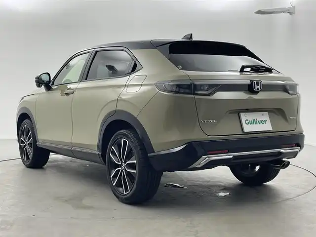 ホンダ ヴェゼル ハイブリッド e:HEV PLaY 福井県 2021(令3)年 4.9万km サンドカーキパール 純正9インチワイドナビゲーション/Honda SENSING/・衝突軽減ブレーキ/・先行者発進お知らせ機能/・レーンキープアシスト/・標識認識機能/・アダプティブクルーズコントロール/ブラインドスポットインフォメーション/後退出庫サポート/ETC2.0車載器/置くだけ充電/ヒーテッドドアミラー/熱線入りフロントウインドウ/運転席助手席シートヒーター/ハンズフリーアクセスパワーテールゲート/LEDシーケンシャルターンシグナルランプ/マルチビューカメラシステム＋プレミアムオーディオ/パノラマルーフ/コンビシート(PLaY専用)/18インチアルミホイール/保証書