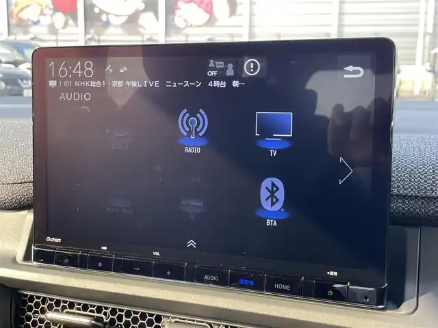 ホンダ ステップワゴン eHEV エアー EX 滋賀県 2025(令7)年 0.1万km未満 プラチナホワイトパール 登録済未使用車/純正11.4型ナビ/CD/DVD/SD/USB/Bluetooth/フルセグTV/バックカメラ/ＢＳＩ/ホンダセンシング/クルーズコントロール/パドルシフト/パワーバックドア/シートヒーター/両側パワースライドドア/オットマン/革巻きステアリング/LEDヘッドライト/オートハイビーム/純正アルミホイール