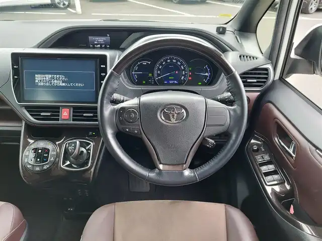 トヨタ エスクァイア ハイブリッド Gi プレミアムパッケージ 東京都 2018(平30)年 5.3万km ホワイトパールクリスタルシャイン 純正10インチナビ/・Bluetoothオーディオ/・フルセグTV/・DVD/CD/バックカメラ/ETC/ドライブレコーダー/両側パワースライドドア/ハーフレザーシート/シートヒーター/ステアリングヒーター/コーナーセンサー/プリクラッシュセーフティ/レーンディパーチャーアラート/オートハイビーム