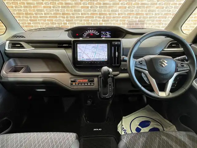 スズキ ソリオ バンディット HV MV 岩手県 2022(令4)年 2万km メロウディープレッドパール/ブラック ワンオーナー/４WD/衝突被害軽減システム/片側パワースライドドア/全方位モニター/横滑り防止装置/アイドリングストップ/クルーズコントロール/フルセグTV/コーナーセンサー/レーンアシスト/シートヒーター/純正ナビ/純正アルミホイール１５インチ/純正LEDヘッドライト/オートライト/オートマチックハイビーム