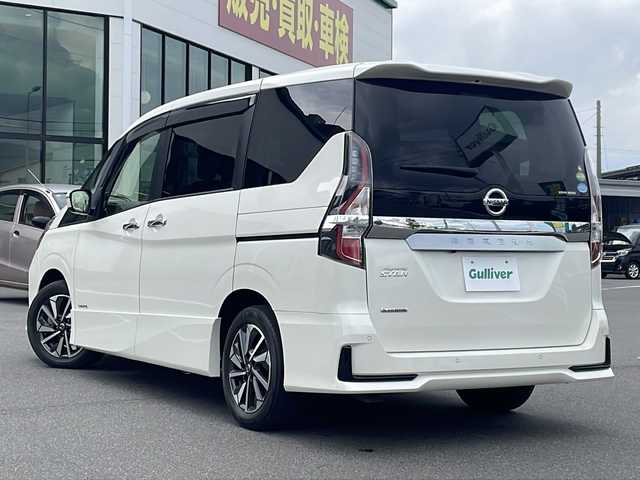 日産 セレナ ハイウェイスター V 長野県 2021(令3)年 3.3万km ブリリアントホワイトパール プロパイロット/インテリジェントエマージェンシーブレーキ/踏み間違い衝突防止アシスト/車線逸脱防止支援システム/車線逸脱警報/後側方衝突防止アシスト/後方車両検知警報/後退時車両検知警報/前方衝突予測警報/コーナーセンサー/純正フリップダウンモニター/純正10インチSDナビ/（CD/DVD/フルセグTV/BT）/バックカメラ/ビルトインETC/ドライブレコーダー/ハンズフリーパワースライドドア（両側）/ブラインドスポットモニター/革巻きステアリング/ステアリングスイッチ/電動パーキングブレーキ/ブレーキホールド/LEDヘッドランプ/フォグランプ/オートライト/スマートキー/Pスタート/電動格納ミラー/純正フロアマット/純正16インチAW