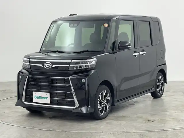 ダイハツ タント カスタム X 群馬県 2025(令7)年 0.3万km ブラックマイカメタリック 純正ディスプレイオーディオ/バックカメラ/衝突軽減ブレーキ/アイドリングストップ/電動格納ミラー/スマートキー/両側パワースライドドア/クリアランスソナー/LEDオートライト/シートヒーター/ハーフレザーシート/純正フロアマット/純正アルミホイール/横滑り防止装置/盗難防止装置
