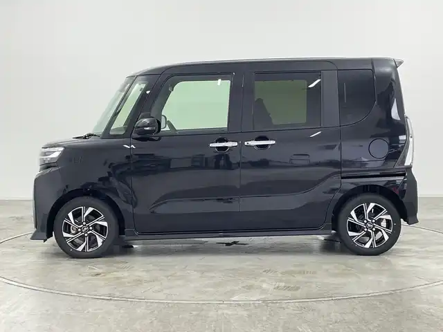 ダイハツ タント カスタム X 群馬県 2025(令7)年 0.3万km ブラックマイカメタリック 純正ディスプレイオーディオ/バックカメラ/衝突軽減ブレーキ/アイドリングストップ/電動格納ミラー/スマートキー/両側パワースライドドア/クリアランスソナー/LEDオートライト/シートヒーター/ハーフレザーシート/純正フロアマット/純正アルミホイール/横滑り防止装置/盗難防止装置