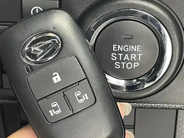 ダイハツ タント カスタム X 群馬県 2025(令7)年 0.3万km ブラックマイカメタリック 純正ディスプレイオーディオ/バックカメラ/衝突軽減ブレーキ/アイドリングストップ/電動格納ミラー/スマートキー/両側パワースライドドア/クリアランスソナー/LEDオートライト/シートヒーター/ハーフレザーシート/純正フロアマット/純正アルミホイール/横滑り防止装置/盗難防止装置