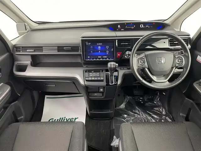 ホンダ ステップワゴン スパーダ ホンダセンシング 埼玉県 2018(平30)年 5万km プレミアムスパークルブラックパール 純正９型ナビ　１１．６型フリップダウンモニター　バックカメラ　両側パワースライドドア　ビルトインＥＴＣ　ＬＥＤヘッドライト　フルセグ　Ｂｌｕｅｔｏｏｔｈ　ウォークスルー　ＭＴモード付　衝突軽減