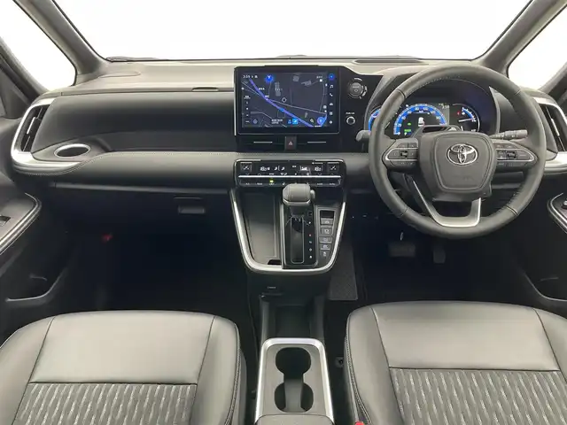 トヨタ ノア ハイブリッド S－Z 愛知県 2024(令6)年 0.6万km ホワイトパールクリスタルシャイン 純正１０．５型ディスプレイナビ　ＴＶ　ＨＤＭＩ　デジタルインナーミラー　快適利便Ｈｉｇｈ　三眼ＬＥＤライト　ＢＳＭ　降車アシスト　ドライビングサポート　セーフティセンス　衝突軽減　追従クルコン　シートヒーター　電動リアゲート　両側パワースライドドア　オットマン　ハンドルヒーター　ETC２．０　コーナーセンサー　AC100V電源　HUD　オートホールド　禁煙車
