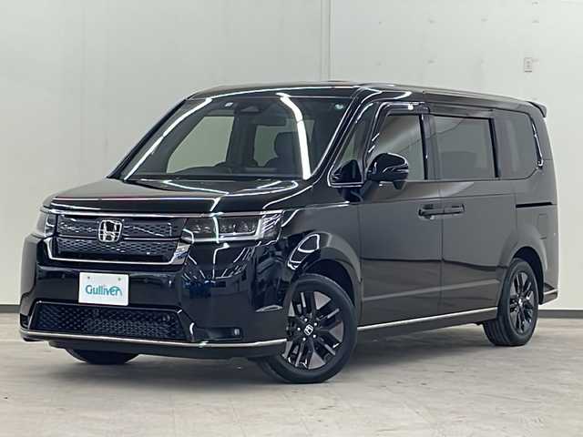 ホンダ ステップワゴン スパーダ 道央・札幌 2022(令4)年 1.5万km クリスタルブラックパール /4WD//純正１１．４インチナビ(CD/DVD/TV/FM/AM/BT)//純正フリップダウンモニター//ホンダセンシング/・車線逸脱警報/・歩行者事故低減ステアリング/・先行車発進お知らせ/・衝突軽減/・パーキングセンサー警報/・ブラインドスポットインフォメーション/・アダプティブクルーズコントロール/・前後コーナーセンサー//前席シートヒーター//パワーバックドア//オートライト//スペアキー１本//ETC//両側パワースライドドア//ウインカーミラー//ステアリングスイッチ//パドルシフト//左右独立エアコン//クラッツィオシートカバー