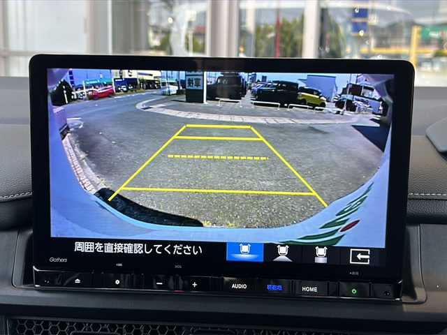 ホンダ ステップワゴン スパーダ eHEV 静岡県 2025(令7)年 0.1千km プラチナホワイトパール 純正ナビ/・CD/DVD/・RADIO/・フルセグTV/・Music Rack/・SD/・USB/・BTA/ホンダセンシング/・衝突軽減ブレーキ（CMBS）/・先行車発進お知らせ機能/・歩行者事故低減ステアリング/・路外逸脱抑制機能/・標識認識機能/・渋滞追従機能付アダプティブクルーズコントロール（ACC）/・車線維持支援システム（LKAS）/・トラフィックジャムアシスト（渋滞運転支援機能）/・ブラインドスポットインフォメーション/・誤発進抑制機能/・後方誤発進抑制機能/・近距離衝突軽減ブレーキ/・急アクセル抑制機能/・パーキングセンサーシステム/・オートハイビーム/主要装備/・両側パワースライドドア/・バックカメラ/・電動パーキング/・パドルシフト/・パワーバックドア/・運転席+助手席シートヒーター/・リアオートエアコン/・減速セレクター/・全列ＵＳＢチャージャー/・２列目オットマン/・SPADA専用16インチアルミ
