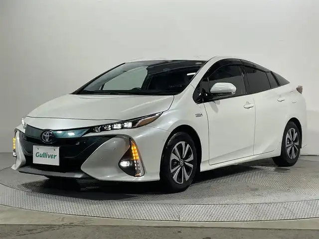 トヨタ プリウス ＰＨＶ A ユーティリティプラス 大阪府 2018(平30)年 8.8万km ホワイトパールクリスタルシャイン フルセグテレビ/バックカメラ/ウィンカーミラー/クルーズコントロール/プッシュスタート/ETC/純正大型ナビ/衝突軽減/クルーズコントロール/コーナーセンサー/ブラインドスポットモニター/電動ミラー/フォグランプ/純正アルミホイール