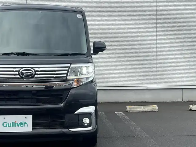 ダイハツ タント カスタム X 秋田県 2018(平30)年 6.6万km ブラックマイカメタリック ４WD/片側パワースライドドア/LEDヘッドライト/社外SDナビ（DVD再生不可能）/ワンセグ/バックカメラ/ダイハツ純正１４インチアルミ（夏タイヤ装着）/スマートキー/アイドリングストップ/プッシュスタート/運転席シートヒーター/ETC/ステアリングスイッチ/社外フロアマット/社外ドアバイザー/オートライト/オートエアコン/パワーステアリング/パワーウィンドウ/横滑り防止/盗難防止装置/寒冷地仕様/電動格納ウィンカーミラー/保証書/取扱説明書/記録簿/スペアキー×１