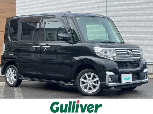 ダイハツ タント カスタム X 秋田県 2018(平30)年 6.6万km ブラックマイカメタリック ４WD/片側パワースライドドア/LEDヘッドライト/社外SDナビ（DVD再生不可能）/ワンセグ/バックカメラ/ダイハツ純正１４インチアルミ（夏タイヤ装着）/スマートキー/アイドリングストップ/プッシュスタート/運転席シートヒーター/ETC/ステアリングスイッチ/社外フロアマット/社外ドアバイザー/オートライト/オートエアコン/パワーステアリング/パワーウィンドウ/横滑り防止/盗難防止装置/寒冷地仕様/電動格納ウィンカーミラー/保証書/取扱説明書/記録簿/スペアキー×１