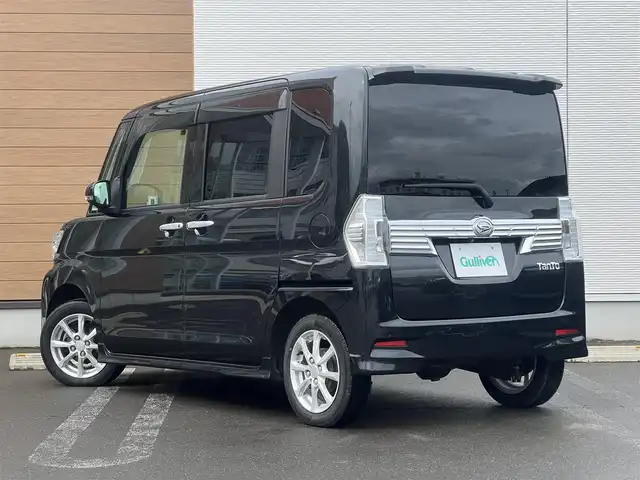 ダイハツ タント カスタム X 秋田県 2018(平30)年 6.6万km ブラックマイカメタリック ４WD/片側パワースライドドア/LEDヘッドライト/社外SDナビ（DVD再生不可能）/ワンセグ/バックカメラ/ダイハツ純正１４インチアルミ（夏タイヤ装着）/スマートキー/アイドリングストップ/プッシュスタート/運転席シートヒーター/ETC/ステアリングスイッチ/社外フロアマット/社外ドアバイザー/オートライト/オートエアコン/パワーステアリング/パワーウィンドウ/横滑り防止/盗難防止装置/寒冷地仕様/電動格納ウィンカーミラー/保証書/取扱説明書/記録簿/スペアキー×１