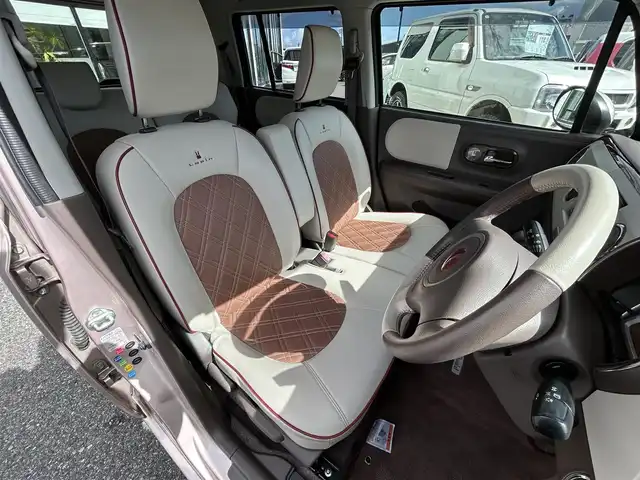スズキ ラパン ショコラ G 鳥取県 2014(平26)年 6.1万km シャンパンピンクPM 社外ナビ/フルセグ/DVD/CD/USB/ETC/専用レザーシート/専用革巻きハンドル/専用14インチアルミホイール/専用メッキパーツ/キセノンライト/オートライト/プッシュスタートエンジン/アイドリングストップ/電動格納ミラー/フロアマット/ドアバイザー/取扱説明書/スペアキー
