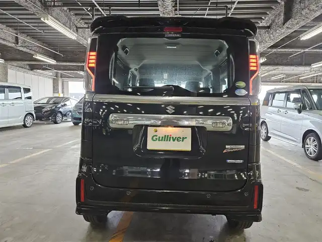 スズキ スペーシア カスタム HYBRID GS 愛媛県 2018(平30)年 4.5万km ブルーイッシュブラックパール3 ワンオーナー/パナソニックナビ/フルセグTV/パワースライドドア(片側)/ETC/ドライブレコーダー/パーキングセンサー/セーフティサポート/・デュアルセンサーブレーキサポート/・後退時ブレーキサポート/・誤発進抑制機能(前後)/・車線逸脱警報機能/・ふらつき警報機能/・先行車発進お知らせ機能/・ハイビームアシスト/LEDヘッドランプ/ステアリングスイッチ/運転席シートヒーター/純正14インチアルミホイール/キーレスプッシュスタートシステム/禁煙車