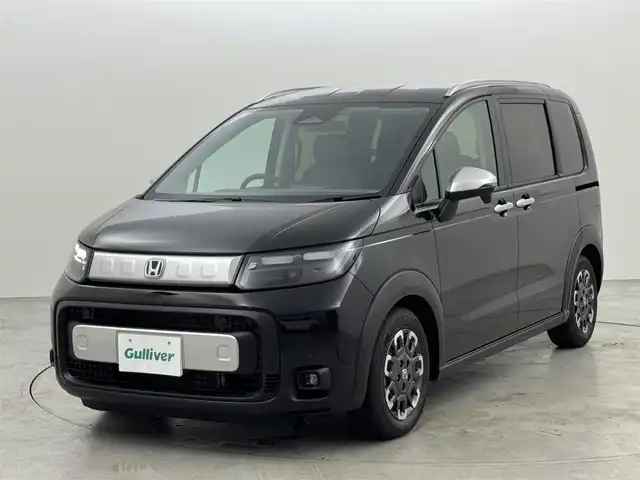 ホンダ フリード ハイブリット e:HEV クロスター 福岡県 2025(令7)年 0.1千km クリスタルブラックパール 登録済未使用車　/純正９型ナビ　/バックカメラ　/コーナーセンサー　/アダプティブクルコン　/衝突軽減ブレーキ　/レーンキープ　/アクセル踏み間違い防止　/ＢＳＭ　/両側電動スライドドア　/ハーフレザー　/シートヒーター　/ＬＥＤ