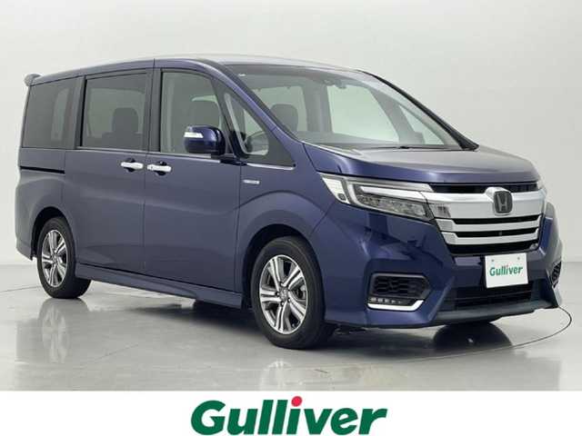 ホンダ ステップワゴン スパーダ ハイブリッド G EX ホンダセンシング 熊本県 2017(平29)年 5.4万km オブシダンブルーパール 禁煙車　/純正ナビVXM-185VFNi（ＣＤ・ＤＶＤ・フルセグ・ＢＴ・ＳＤ・ＵＳＢ）/全周囲カメラ　/純正前方ドライブレコーダー　/両側パワースライドドア　/レーダークルーズコントロール　/衝突軽減ブレーキ　/レーンキープアシスト/横滑り防止/アイドリングストップ/純正フロアマット/純正１６インチAW/オートライト/オートマチックハイビーム/LEDヘッドライト/フォグライト/スマートキー/プッシュスタート/取扱説明書