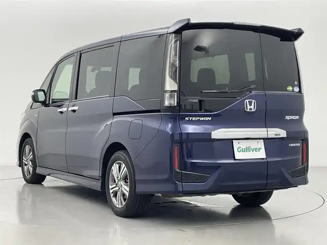 ホンダ ステップワゴン スパーダ ハイブリッド G EX ホンダセンシング 熊本県 2017(平29)年 5.4万km オブシダンブルーパール 禁煙車　/純正ナビVXM-185VFNi（ＣＤ・ＤＶＤ・フルセグ・ＢＴ・ＳＤ・ＵＳＢ）/全周囲カメラ　/純正前方ドライブレコーダー　/両側パワースライドドア　/レーダークルーズコントロール　/衝突軽減ブレーキ　/レーンキープアシスト/横滑り防止/アイドリングストップ/純正フロアマット/純正１６インチAW/オートライト/オートマチックハイビーム/LEDヘッドライト/フォグライト/スマートキー/プッシュスタート/取扱説明書