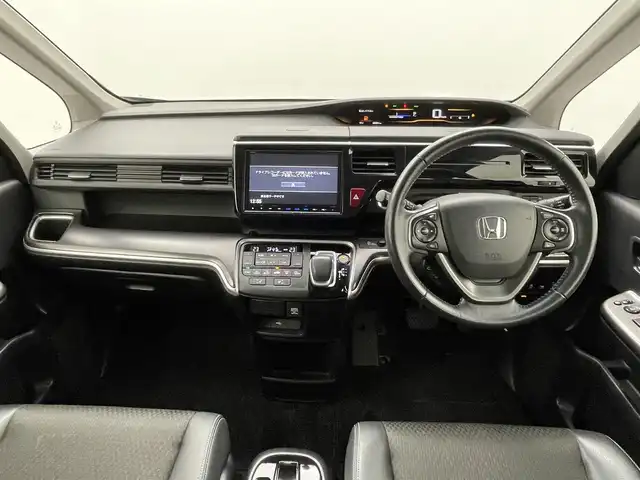 ホンダ ステップワゴン スパーダ ハイブリッド G EX ホンダセンシング 熊本県 2017(平29)年 5.4万km オブシダンブルーパール 禁煙車　/純正ナビVXM-185VFNi（ＣＤ・ＤＶＤ・フルセグ・ＢＴ・ＳＤ・ＵＳＢ）/全周囲カメラ　/純正前方ドライブレコーダー　/両側パワースライドドア　/レーダークルーズコントロール　/衝突軽減ブレーキ　/レーンキープアシスト/横滑り防止/アイドリングストップ/純正フロアマット/純正１６インチAW/オートライト/オートマチックハイビーム/LEDヘッドライト/フォグライト/スマートキー/プッシュスタート/取扱説明書