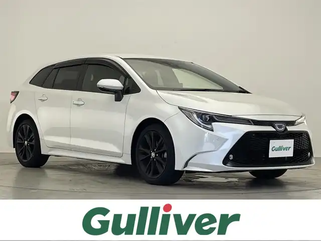 トヨタ カローラツーリング ハイブリッド W×B 50ミリオンED 広島県 2022(令4)年 2.4万km プラチナホワイトパールマイカ 禁煙車/純正ディスプレイオーディオ/(Bluetooth/Miracast)/バックカメラ/シートヒーター/レーダークルコン/ステアリングヒーター/BSM/LEDヘッドライト/オートハイビーム/スマートキー/スペアキー/プッシュスタート