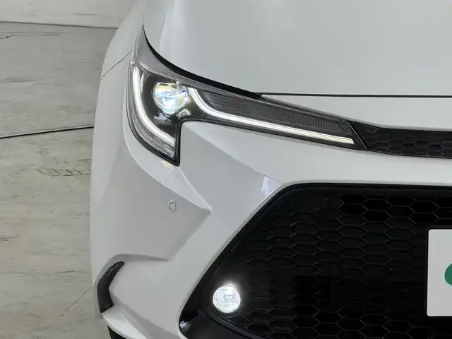 トヨタ カローラツーリング ハイブリッド W×B 50ミリオンED 福岡県 2022(令4)年 2.4万km プラチナホワイトパールマイカ 禁煙車/純正8型ディスプレイオーディオ/(Bluetooth/Miracast)/バックカメラ/シートヒーター/レーダークルコン/ステアリングヒーター/BSM/LEDヘッドライト/オートハイビーム/スマートキー/スペアキー/プッシュスタート