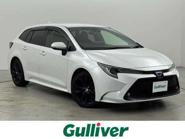 トヨタ カローラツーリング ハイブリッド W×B 50ミリオンED 福岡県 2022(令4)年 2.4万km プラチナホワイトパールマイカ 禁煙車/純正8型ディスプレイオーディオ/(Bluetooth/Miracast)/バックカメラ/シートヒーター/レーダークルコン/ステアリングヒーター/BSM/LEDヘッドライト/オートハイビーム/スマートキー/スペアキー/プッシュスタート