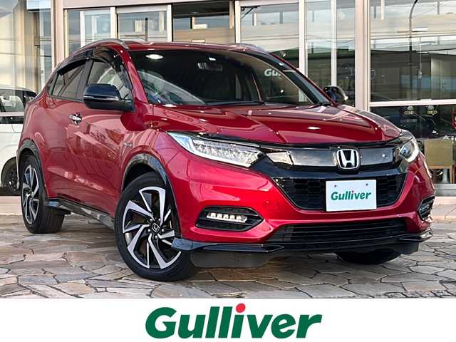 ホンダ ヴェゼル ハイブリッド RS ホンダセンシング 静岡県 2020(令2)年 2.3万km プレミアムクリスタルレッドM ホンダセンシング/・衝突軽減ブレーキ/・誤発進抑制機能/・車線維持支援システム/・標識認識機能/・コーナーセンサー/純正ナビ/・ラジオ/・CD/DVD/フルセグTV/Bluetooth/SD/USB/ipod/主要装備/・レーダークルーズコントロール　/・ドライブレコーダー　/・ＥＴＣ　/・バックカメラ　/・純正デジタルインナーミラー　/・ステアリングリモコン　/・パドルシフト　/・アイドリングストップ/・プッシュスタート/・ブレーキホールド/・LEDヘッドライト/・LEDフォグランプ