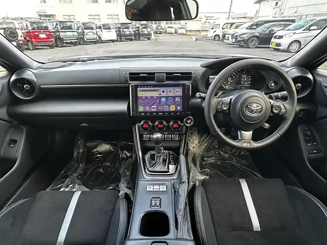 トヨタ ＧＲ８６ RZ 福島県 2024(令6)年 0.5万km クリスタルホワイトパール アイサイトコアテクノロジー/プリクラッシュブレーキ/後退時ブレーキアシスト/誤発進抑制制御/全車速追従機能付きクルーズコントロール/後側方警戒支援システム/ハイビームアシスト/社外ディスプレイオーディオ/【USB/BT】/バックカメラ/ETC/前席シートヒーター/パドルシフト/ステアリングリモコン/LEDオートライト/社外フロアマット