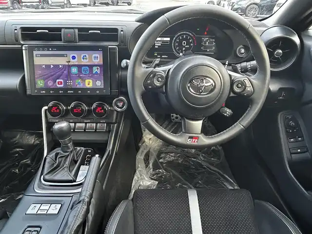 トヨタ ＧＲ８６ RZ 福島県 2024(令6)年 0.5万km クリスタルホワイトパール アイサイトコアテクノロジー/プリクラッシュブレーキ/後退時ブレーキアシスト/誤発進抑制制御/全車速追従機能付きクルーズコントロール/後側方警戒支援システム/ハイビームアシスト/社外ディスプレイオーディオ/【USB/BT】/バックカメラ/ETC/前席シートヒーター/パドルシフト/ステアリングリモコン/LEDオートライト/社外フロアマット