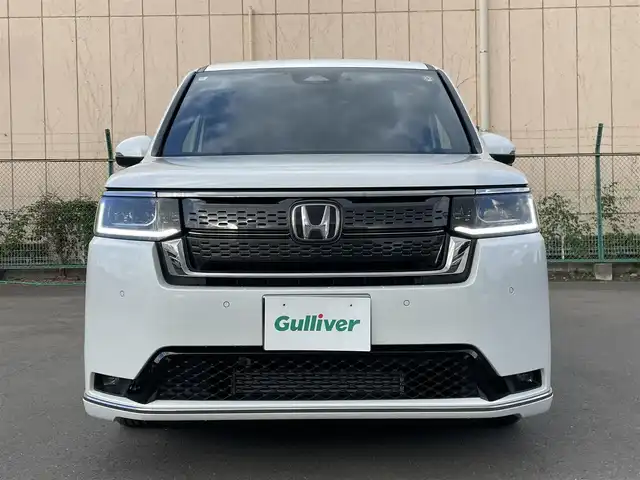 ホンダ ステップワゴン スパーダ 東京都 2024(令6)年 0.9万km プラチナホワイトパール ワンオーナー/純正11.4型ナビ/フルセグTV/CD/DVD/純正15.6型天吊モニター/アドバンスドルームミラー/ホンダセンシング/前席シートヒーター/両側電動ドア/電動リアゲート/ETC/前後ドライブレコーダー