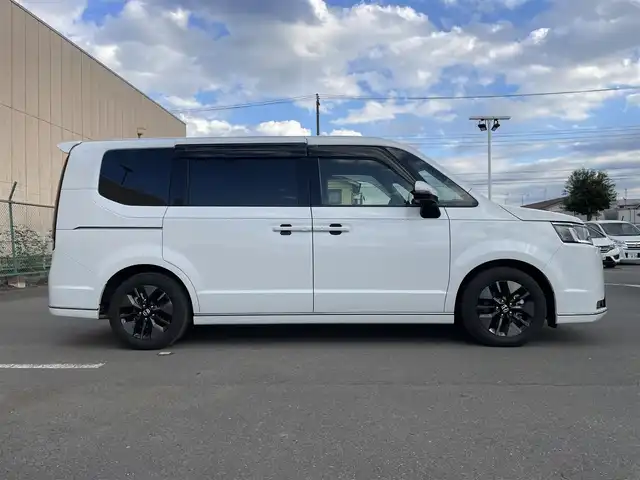 ホンダ ステップワゴン スパーダ 東京都 2024(令6)年 0.9万km プラチナホワイトパール ワンオーナー/純正11.4型ナビ/フルセグTV/CD/DVD/純正15.6型天吊モニター/アドバンスドルームミラー/ホンダセンシング/前席シートヒーター/両側電動ドア/電動リアゲート/ETC/前後ドライブレコーダー