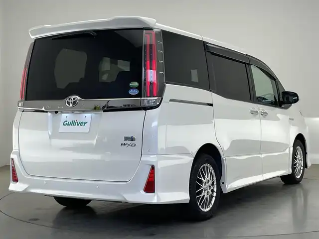 トヨタ ノア ハイブリッド Si ダブルバイビーⅡ 愛知県 2020(令2)年 4.2万km ホワイトパールクリスタルシャイン 純正９型ナビ　フルセグＴＶ　純正１２．１型後席モニター　シートヒーター　ハーフレザー　バックカメラ　ＥＴＣ　両側パワースライドドア　セーフティセンス　衝突軽減　コーナーセンサー　ＬＥＤライト　禁煙車