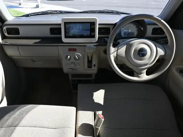 スズキ ラパン L 千葉県 2015(平27)年 2.9万km フォーンベージュM スズキセーフティサポート/アイドリングストップ/純正メモリーナビ/地デジTV/【DVD/CD再生機能　Bluetooth接続】/運転席シートヒーター/携帯リモコン