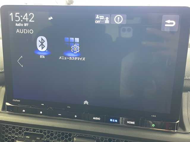 ホンダ ステップワゴン スパーダ eHEV 岐阜県 2025(令7)年 0.1千km プラチナホワイトパール 登録済み未使用車/純正11.4インチナビゲーション【LXM-247VFLi】/AppleCarplay /Android Auto/Bluetooth /CD DVD/フルセグテレビ/AM FM/SD/USB/革巻きステアリング/ステアリングリモコン/パドルシフト/メモリー機能付きパワーバックドア/ハーフレザーシート/シートヒーター(D/N席)/ ２列目シートオットマン/全列USBチャージャー付/両側パワースライドドア/LEDヘッドライト/ヘッドライトレベライザー/オートハイビーム/アダプティブドライビングビーム/スマートキー/プッシュスタート/スペアキー有/ホンダセンシング/先行車発進お知らせ機能/歩行者事故低減ステアリング/路外逸脱抑制機能/標識認識機能/渋滞追従機能付アダプティブクルーズコントロール（ACC）/車線維持支援システム（LKAS）/トラフィックジャムアシスト（渋滞運転支援機能）/ブラインドスポットインフォメーション/誤発進抑制機能/後方誤発進抑制機能/近距離衝突軽減ブレーキ/アクセル抑制機能/パーキングセンサーシステム/後退出庫サポート/減速セレクター