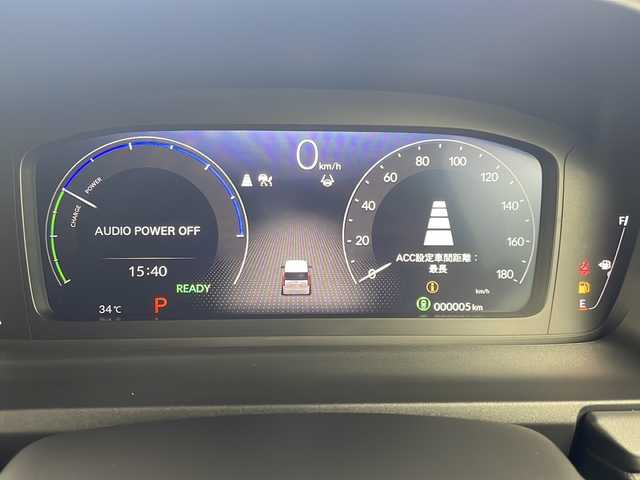 ホンダ ステップワゴン スパーダ eHEV 岐阜県 2025(令7)年 0.1千km プラチナホワイトパール 登録済み未使用車/純正11.4インチナビゲーション【LXM-247VFLi】/AppleCarplay /Android Auto/Bluetooth /CD DVD/フルセグテレビ/AM FM/SD/USB/革巻きステアリング/ステアリングリモコン/パドルシフト/メモリー機能付きパワーバックドア/ハーフレザーシート/シートヒーター(D/N席)/ ２列目シートオットマン/全列USBチャージャー付/両側パワースライドドア/LEDヘッドライト/ヘッドライトレベライザー/オートハイビーム/アダプティブドライビングビーム/スマートキー/プッシュスタート/スペアキー有/ホンダセンシング/先行車発進お知らせ機能/歩行者事故低減ステアリング/路外逸脱抑制機能/標識認識機能/渋滞追従機能付アダプティブクルーズコントロール（ACC）/車線維持支援システム（LKAS）/トラフィックジャムアシスト（渋滞運転支援機能）/ブラインドスポットインフォメーション/誤発進抑制機能/後方誤発進抑制機能/近距離衝突軽減ブレーキ/アクセル抑制機能/パーキングセンサーシステム/後退出庫サポート/減速セレクター