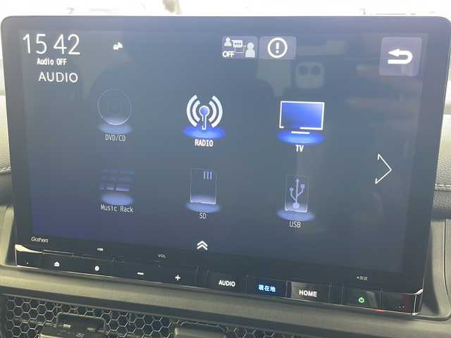 ホンダ ステップワゴン スパーダ eHEV 岐阜県 2025(令7)年 0.1千km プラチナホワイトパール 登録済み未使用車/純正11.4インチナビゲーション【LXM-247VFLi】/AppleCarplay /Android Auto/Bluetooth /CD DVD/フルセグテレビ/AM FM/SD/USB/革巻きステアリング/ステアリングリモコン/パドルシフト/メモリー機能付きパワーバックドア/ハーフレザーシート/シートヒーター(D/N席)/ ２列目シートオットマン/全列USBチャージャー付/両側パワースライドドア/LEDヘッドライト/ヘッドライトレベライザー/オートハイビーム/アダプティブドライビングビーム/スマートキー/プッシュスタート/スペアキー有/ホンダセンシング/先行車発進お知らせ機能/歩行者事故低減ステアリング/路外逸脱抑制機能/標識認識機能/渋滞追従機能付アダプティブクルーズコントロール（ACC）/車線維持支援システム（LKAS）/トラフィックジャムアシスト（渋滞運転支援機能）/ブラインドスポットインフォメーション/誤発進抑制機能/後方誤発進抑制機能/近距離衝突軽減ブレーキ/アクセル抑制機能/パーキングセンサーシステム/後退出庫サポート/減速セレクター