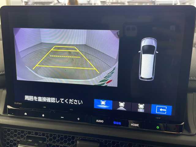 ホンダ ステップワゴン スパーダ eHEV 岐阜県 2025(令7)年 0.1千km プラチナホワイトパール 登録済み未使用車/純正11.4インチナビゲーション【LXM-247VFLi】/AppleCarplay /Android Auto/Bluetooth /CD DVD/フルセグテレビ/AM FM/SD/USB/革巻きステアリング/ステアリングリモコン/パドルシフト/メモリー機能付きパワーバックドア/ハーフレザーシート/シートヒーター(D/N席)/ ２列目シートオットマン/全列USBチャージャー付/両側パワースライドドア/LEDヘッドライト/ヘッドライトレベライザー/オートハイビーム/アダプティブドライビングビーム/スマートキー/プッシュスタート/スペアキー有/ホンダセンシング/先行車発進お知らせ機能/歩行者事故低減ステアリング/路外逸脱抑制機能/標識認識機能/渋滞追従機能付アダプティブクルーズコントロール（ACC）/車線維持支援システム（LKAS）/トラフィックジャムアシスト（渋滞運転支援機能）/ブラインドスポットインフォメーション/誤発進抑制機能/後方誤発進抑制機能/近距離衝突軽減ブレーキ/アクセル抑制機能/パーキングセンサーシステム/後退出庫サポート/減速セレクター