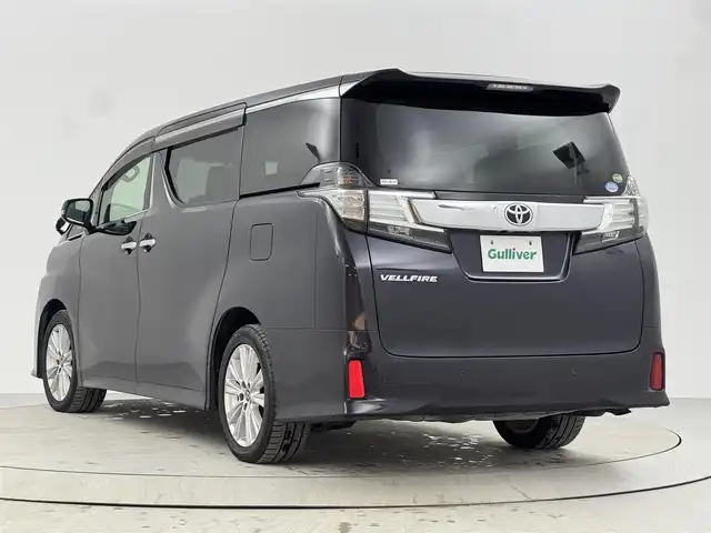 トヨタ ヴェルファイア Z Aエディション 熊本県 2015(平27)年 6.3万km スパークリングブラックパールクリスタルシャイン 純正9インチナビ（NSZT-Y６４T)/バックカメラ/フルセグTV/BT/CD/DVD/衝突軽減ブレーキ/レーダークルコン/オートライト/前後コーナーセンサー/純正フリップダウンモニター/両側パワスラ/ビルトインETC/オットマン/LEＤヘッドライト/フォグランプ/１００V充電/純正18インチアルミ/純正フロアマット/プッシュスタート