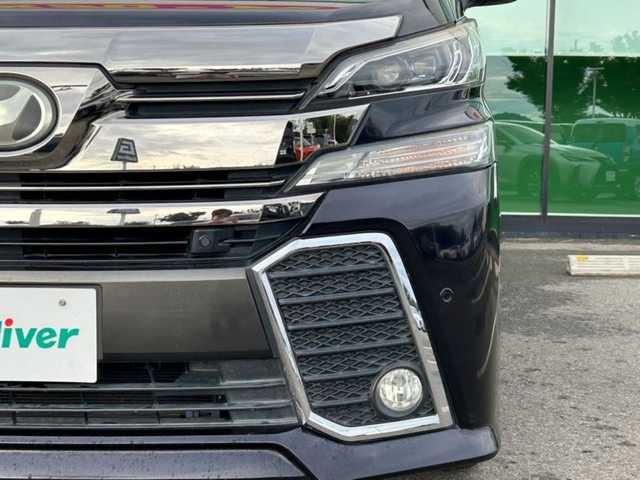 トヨタ ヴェルファイア Z Aエディション 和歌山県 2015(平27)年 6.3万km スパークリングブラックパールクリスタルシャイン 純正9インチナビ（NSZT-Y６４T)/バックカメラ/フルセグTV/BT/CD/DVD/衝突軽減ブレーキ/レーダークルコン/オートライト/前後コーナーセンサー/純正フリップダウンモニター/両側パワスラ/ビルトインETC/オットマン/LEＤヘッドライト/フォグランプ/１００V充電/純正18インチアルミ/純正フロアマット/プッシュスタート