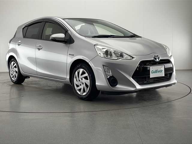 トヨタ アクア S 宮崎県 2015(平27)年 7.4万km シルバーM 禁煙車/純正ナビTV/（NSCP-W64/Bluetooth/CD/FMAM/ワンセグTV)/純正バックカメラ/純正ビルトインETC/純正フロアマット/シートヒーター/オートエアコン/電動格納ミラー/ウインカードアミラー/WSRSエアバック/ABS/リモコンキー/新車時保証書/取扱い説明書