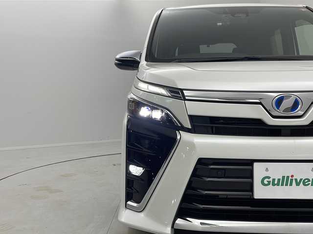 トヨタ ヴォクシー ハイブリッド ZS 煌Ⅱ 茨城県 2019(令1)年 4.6万km ホワイトパールクリスタルシャイン 純正SDナビ　バックカメラ　ETC2.0　前後ドラレコ　追従クルコン　LEDライト　オートライト　オートマチックハイビーム　コーナーセンサー　両側電動パワスラ　横滑り防止装置　レーンキープアシスト