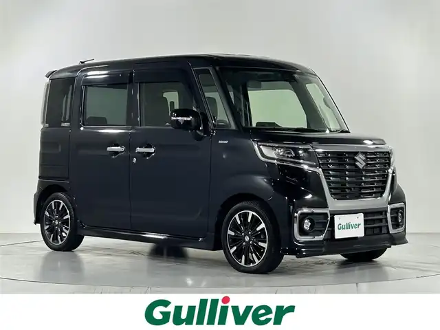 スズキ スペーシア カスタム HYBRID XS ターボ 佐賀県 2018(平30)年 4.4万km ブルーイッシュブラックパール3 純正8インチナビ【CN-RZ83】/【フルセグTV.CD.DVD.Bluetooth】/全周囲カメラ/衝突被害軽減システム/クルーズコントロール/オートライト/オートマチックハイビーム/パーキングソナー/横滑り防止装置/車線逸脱警報/ビルトインETC/両側パワースライドドア/運転席シートヒーター/レザーシート/ISOFIX対応シート/ステアリングスイッチ/サーキュレーター/後席サンシェード/シートバックテーブル/パドルシフト/純正フロアマット/純正15インチアルミホイール/LEDヘッドライト/フォグライト