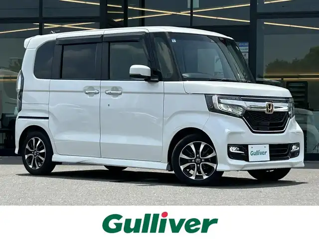 ホンダ Ｎ ＢＯＸ カスタム G L ホンダセンシング 栃木県 2019(令1)年 6.5万km プラチナホワイトパール 純正SDナビ/【AM/FM/CD/DVD//BT/フルセグTV】/バックカメラ/ホンダセンシング/衝突被害軽減ブレーキ/レーダークルーズコントロール/誤発進抑制/車線維持支援/オートハイビーム/クリアランスソナー/両側パワースライドドア/ドライブレコーダー /LEDヘッドライト/ビルトインETC/純正フロアマット/横滑り防止装置