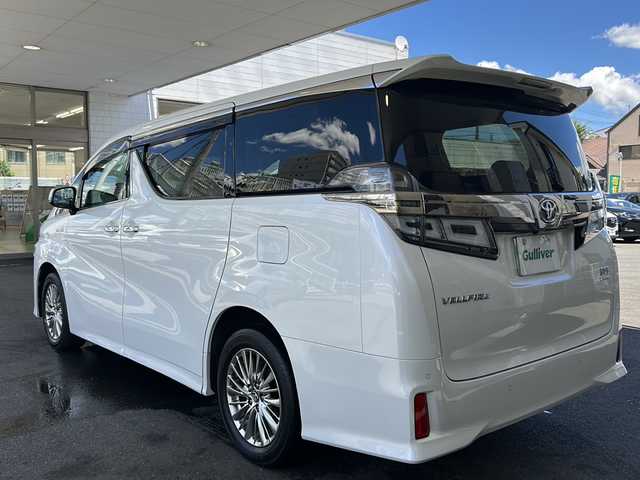 トヨタ ヴェルファイア ハイブリット Z 京都府 2019(平31)年 7.6万km ホワイトパールクリスタルシャイン 純正11インチSDナビ/フルセグTV/Bluetooth Audio/CD/DVD/Blu-ray/USB/HDMI/AUX/アラウンドビューモニター/JBLサウンドシステム/デジタルインナーミラー/フリップダウンモニター/レーダークルーズコントロール/ビルトインETC2.0/前方ドライブレコーダー(ZDR-024)/レーダー探知機/プッシュスタート/プリクラッシュセーフティシステム/パーキングサポートブレーキ/レーンキープアシスト/ロードサインアシスト/クリアランスソナー/BSM/電動パーキングブレーキ/電動格納ウィンカーミラー/オートリトラクタブルミラー/ステアリングスイッチ/オールオートパワーウィンドウ/フォグランプ