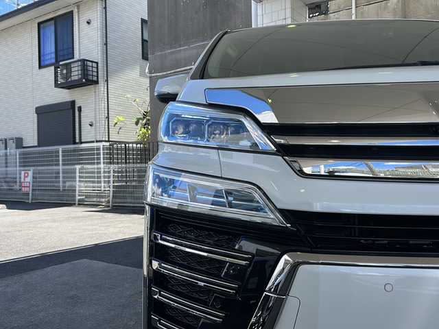 トヨタ ヴェルファイア ハイブリット Z 京都府 2019(平31)年 7.6万km ホワイトパールクリスタルシャイン 純正11インチSDナビ/フルセグTV/Bluetooth Audio/CD/DVD/Blu-ray/USB/HDMI/AUX/アラウンドビューモニター/JBLサウンドシステム/デジタルインナーミラー/フリップダウンモニター/レーダークルーズコントロール/ビルトインETC2.0/前方ドライブレコーダー(ZDR-024)/レーダー探知機/プッシュスタート/プリクラッシュセーフティシステム/パーキングサポートブレーキ/レーンキープアシスト/ロードサインアシスト/クリアランスソナー/BSM/電動パーキングブレーキ/電動格納ウィンカーミラー/オートリトラクタブルミラー/ステアリングスイッチ/オールオートパワーウィンドウ/フォグランプ