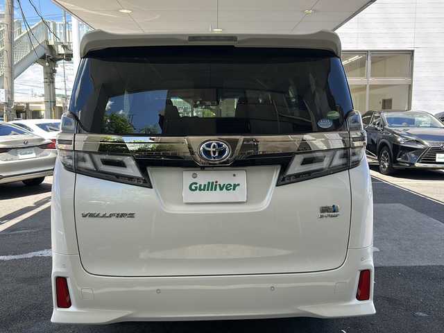 トヨタ ヴェルファイア ハイブリット Z 京都府 2019(平31)年 7.6万km ホワイトパールクリスタルシャイン 純正11インチSDナビ/フルセグTV/Bluetooth Audio/CD/DVD/Blu-ray/USB/HDMI/AUX/アラウンドビューモニター/JBLサウンドシステム/デジタルインナーミラー/フリップダウンモニター/レーダークルーズコントロール/ビルトインETC2.0/前方ドライブレコーダー(ZDR-024)/レーダー探知機/プッシュスタート/プリクラッシュセーフティシステム/パーキングサポートブレーキ/レーンキープアシスト/ロードサインアシスト/クリアランスソナー/BSM/電動パーキングブレーキ/電動格納ウィンカーミラー/オートリトラクタブルミラー/ステアリングスイッチ/オールオートパワーウィンドウ/フォグランプ
