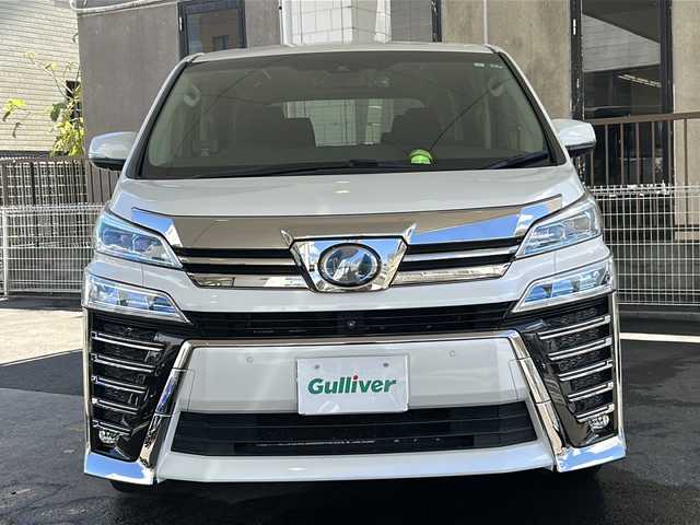 トヨタ ヴェルファイア ハイブリット Z 京都府 2019(平31)年 7.6万km ホワイトパールクリスタルシャイン 純正11インチSDナビ/フルセグTV/Bluetooth Audio/CD/DVD/Blu-ray/USB/HDMI/AUX/アラウンドビューモニター/JBLサウンドシステム/デジタルインナーミラー/フリップダウンモニター/レーダークルーズコントロール/ビルトインETC2.0/前方ドライブレコーダー(ZDR-024)/レーダー探知機/プッシュスタート/プリクラッシュセーフティシステム/パーキングサポートブレーキ/レーンキープアシスト/ロードサインアシスト/クリアランスソナー/BSM/電動パーキングブレーキ/電動格納ウィンカーミラー/オートリトラクタブルミラー/ステアリングスイッチ/オールオートパワーウィンドウ/フォグランプ