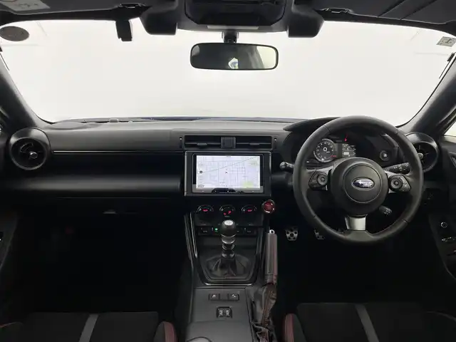 スバル ＢＲＺ STIスポーツ 群馬県 2024(令6)年 1.1万km WRブルーパール STIマフラー/STI Sport 専用装備　あり/・STIチューニング SACHS（ザックス）ダンパー（ZF製）&コイルスプリング/・18インチアルミホイール（ブラック塗装）/・STI製フレキシブルVバー/・STI製フレキシブルドロースティフナーフロント/・TFTカラーマルチインフォメーションディスプレイ付メーター/・アルカンターラ/本革シート（フロントシートヒーター付）/・SUBARU BRZ STI Sportエクステリア/［フロントバンパー、STIエンブレム（フロント&リヤ）、BRZエンブレム（ブラック）］フロントフェンダーガーニッシュ/＝＝＝＝/純正カロッツェリア9インチナビ（AVIC-CQ912)/・CD/DVD/USB/SD(MSV)/・HDMI/Bluetooth/フルセグTV/バックカメラ/アダプティブクルーズコントロール/リアビークルディテクション/ETC/LEDヘッドライト/オートライト /オートマチックハイビーム/スマートキー /プッシュスタート/バックソナー